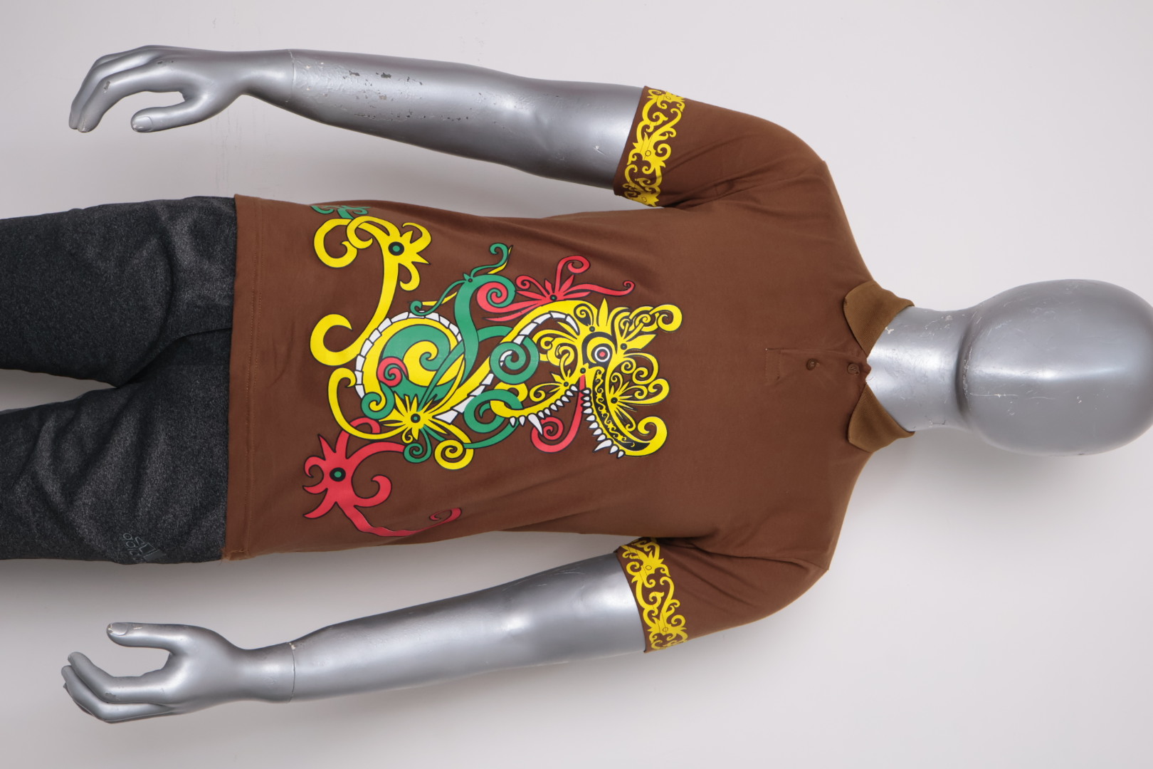 Polo Dayak Naga Abdul Combed 24s Toffee (Pendek)