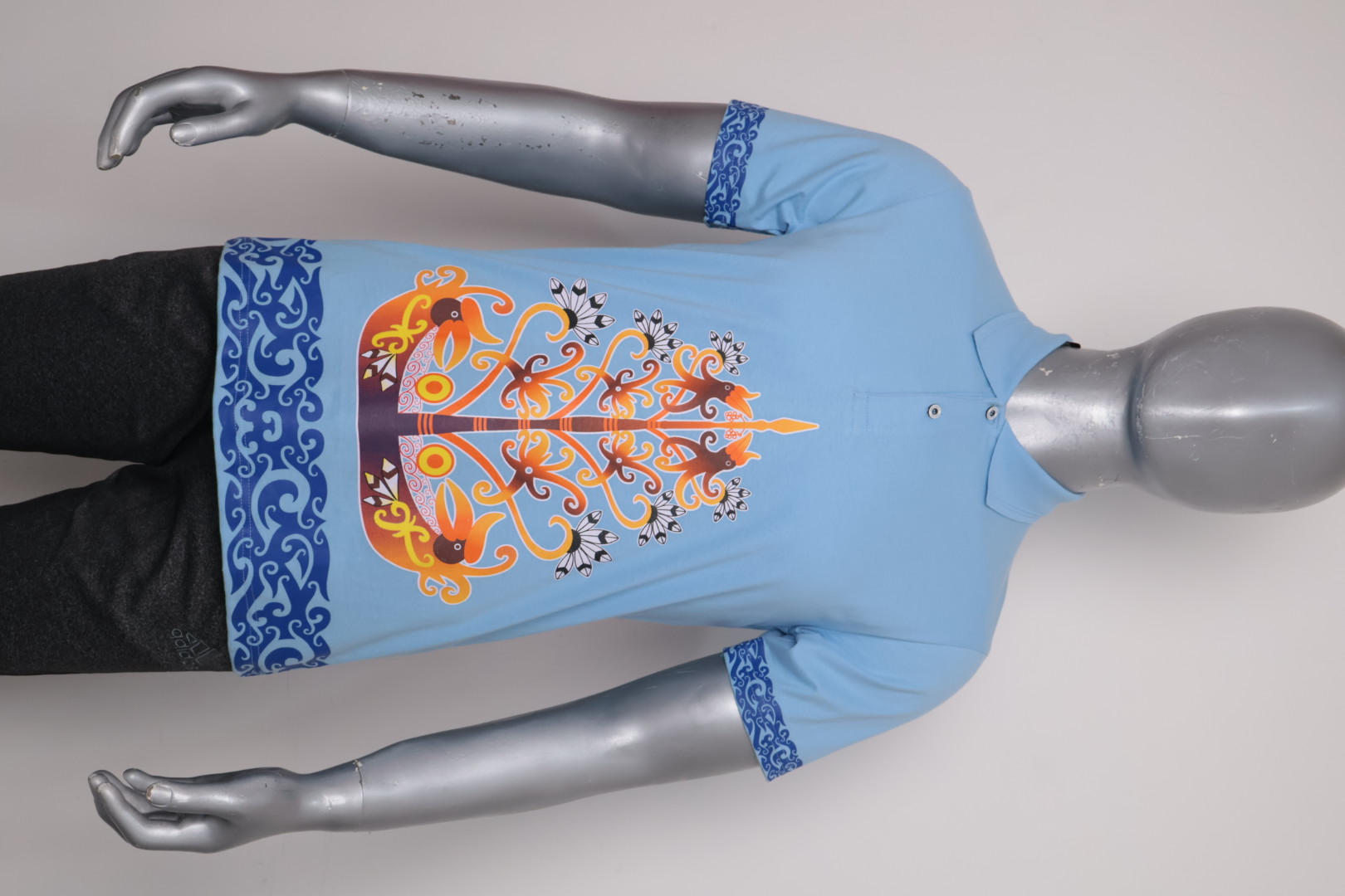 Polo Dayak Batang Garing Berkah Ellanor Combed 24s Biru Muda (Pendek)